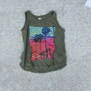 Army green tank with palm trees